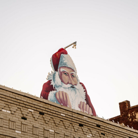 A santa sign over downtown Le Mars Iowa