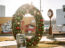 A life-sized wreath acts as the perfect photo taking spot to capture memories at Christmas in LeMars Iowa